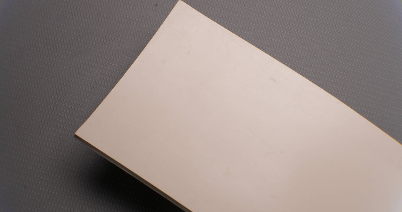 Second front view of rubber conveyor belt with smooth white surface, 3/16 inch thickness, durometer 60, and tensile strength of 700 psi.