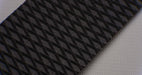 Full length view of rubber conveyor belt with diamond top