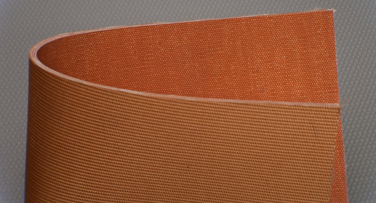 Side view of the friction side conveyor belt showing both tan sides and 9/64 inch thickness, with friction side material on top and bottom.