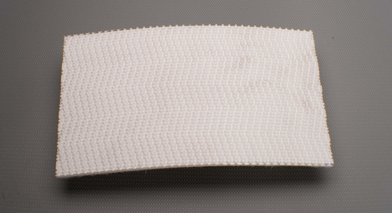 Front side view of a PVC conveyor belt with a rough top and fabric bottom. The belt is 4.5mm thick, white in color for both top and bottom.