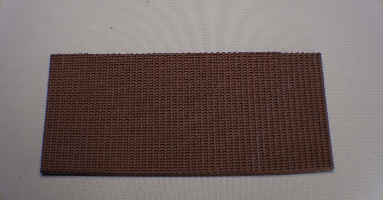 Front side view of the RBR conveyor belt with rough top and fabric bottom, 3 layers, 7mm thickness, brown top, and tan bottom materials.