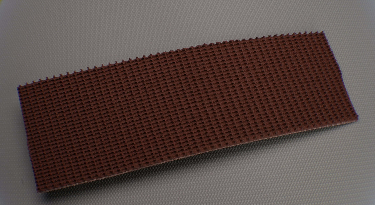 Front view of the RBR conveyor belt with a brown rough top, 7mm thickness, and tan fabric bottom, highlighting the material composition and texture of the top side.
