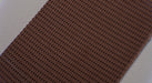 Front side view of the RBR woven conveyor belt with a rough top and fabric bottom, 7mm thickness, brown top, and tan bottom.
