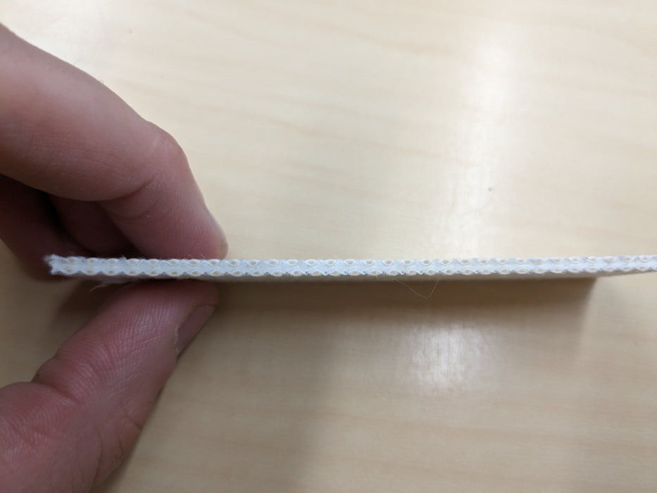 White woven fabric of cotton 2-layer conveyor belt.
